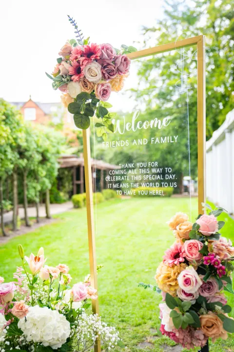 Pink and white floral decorations in a garden