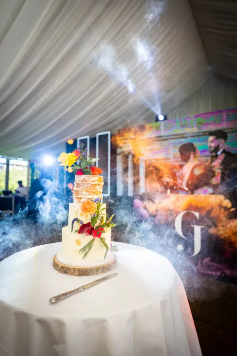 Wedding cake presented with sparklers