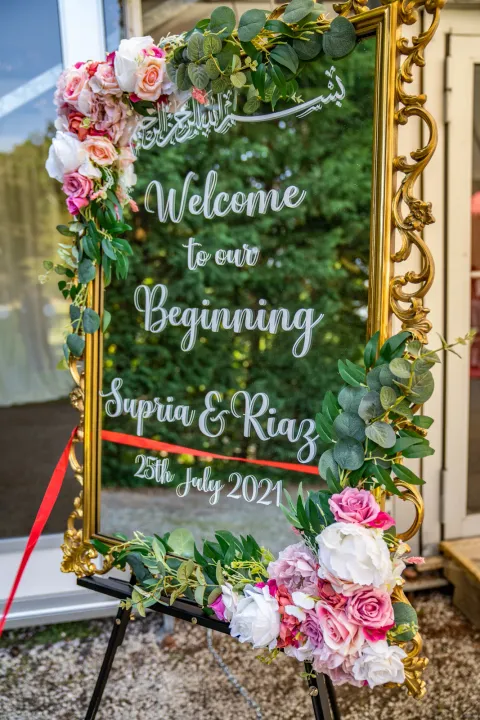 Floral welcome mirror on an easel