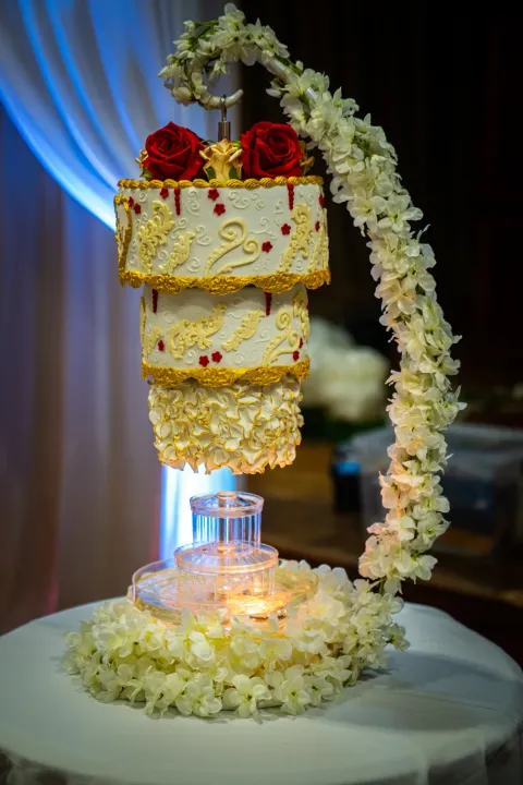 Floral wedding cake with cascading decorations