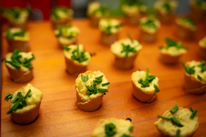 Small savoury bites topped with fresh herbs