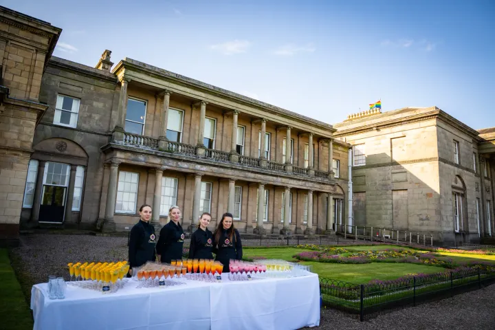 Drinks station on the lawn of a historic venue