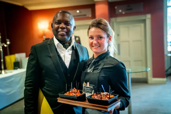 Two team members ready for reception service