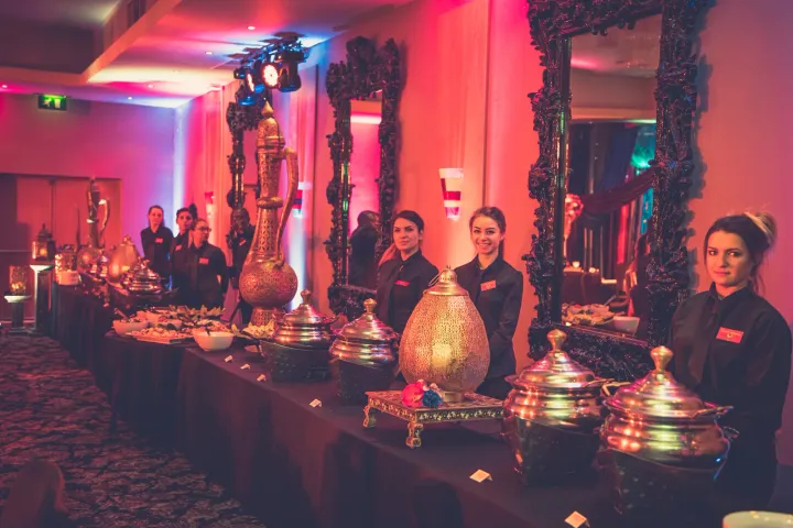 Catering team attending an ornate buffet