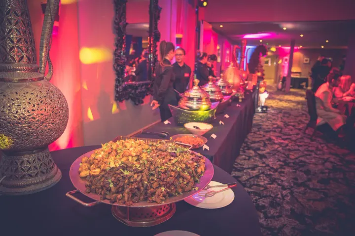 A lavish buffet display in a warmly lit hall
