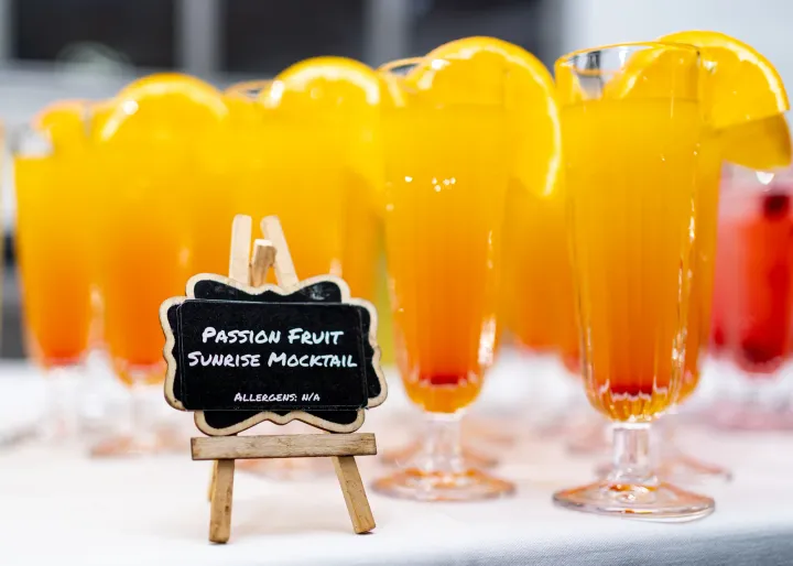 Passion fruit sunrise mocktails with orange slices