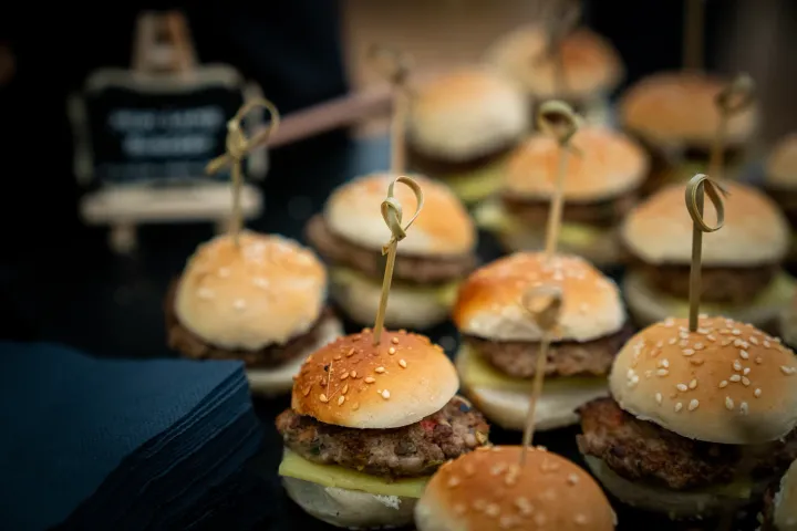 Mini burgers arranged for canapé service