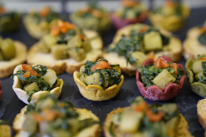 Colourful savoury tartlets with vegetable fillings
