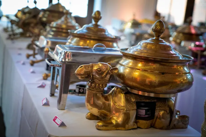 Decorative gold buffet dishes ready for service