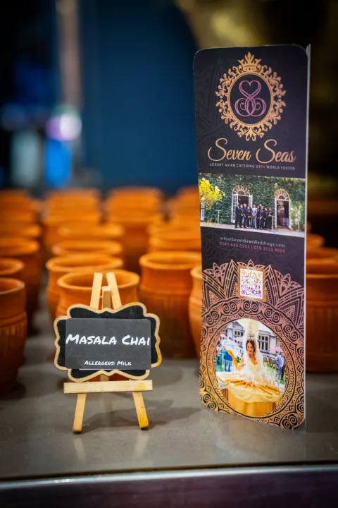 Masala chai cups beside a Seven Seas display