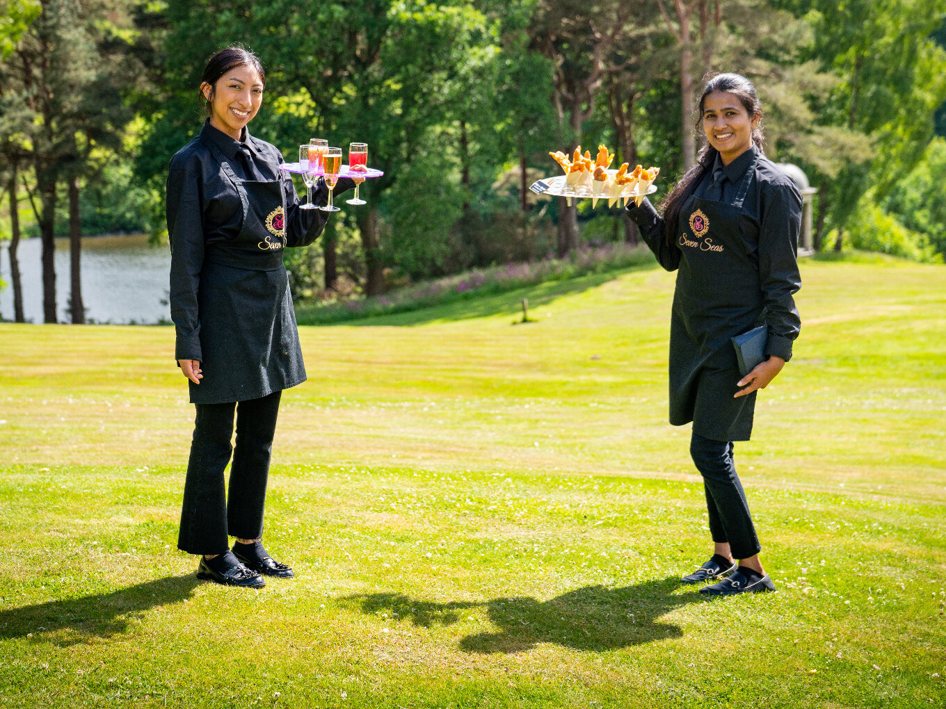 The Seven Seas team serving guests at an elegant event