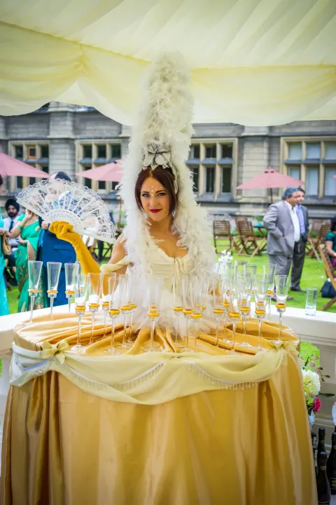A roaming drinks table at a wedding reception
