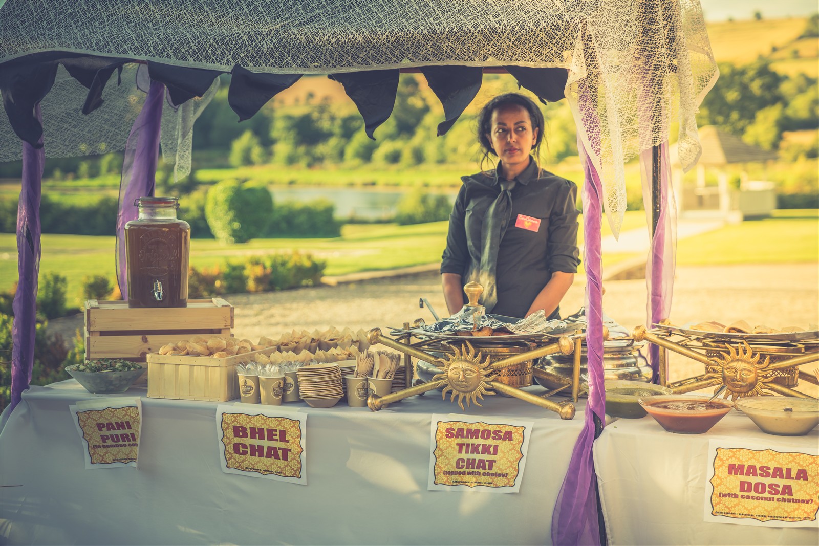 Outdoor live food stall serving chaat and dosa