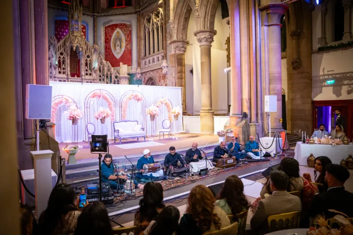 Live musicians performing in a historic wedding hall