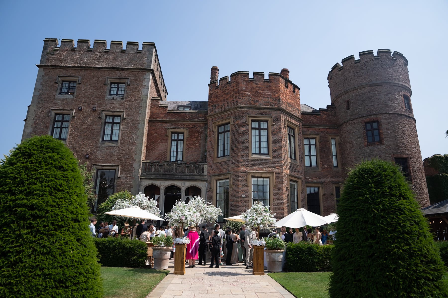 Guests outside a castle venue