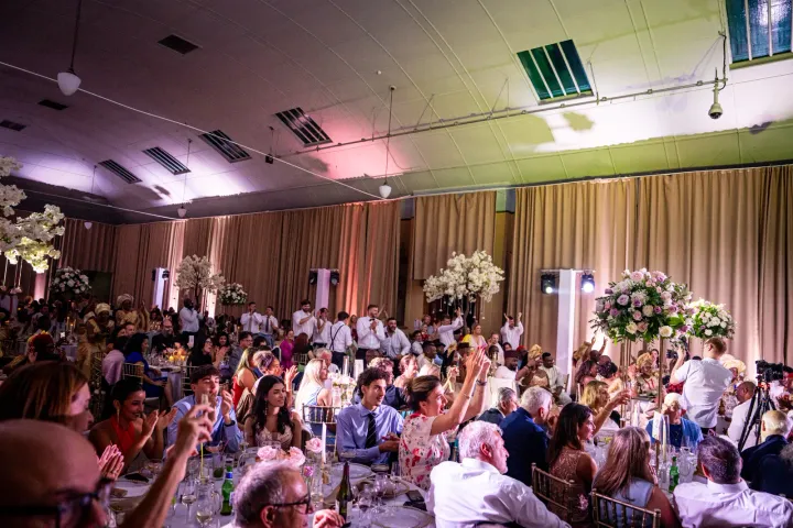 Guests seated at a floral wedding reception