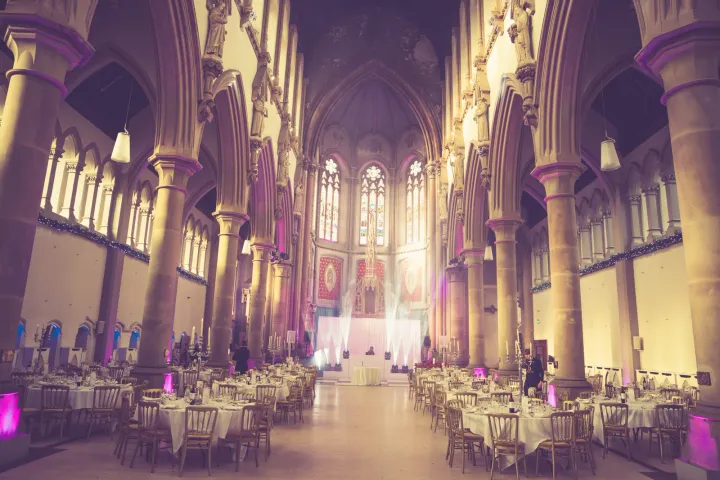 An aisle through a grand historic ceremony room