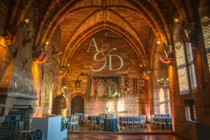 An ornate hall with a timber vaulted roof