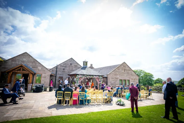 Wedding reception in a rustic venue courtyard