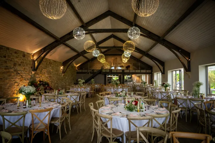Rustic reception room with pendant lighting