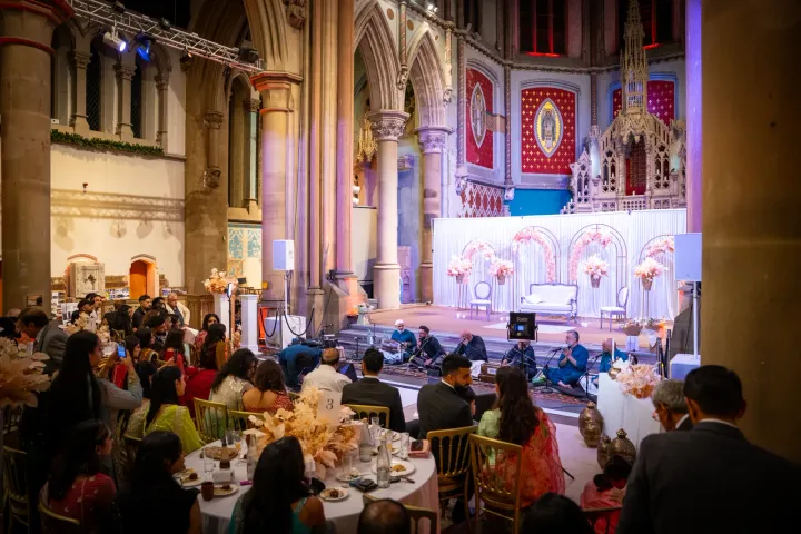 Wedding reception inside an ornate historic hall