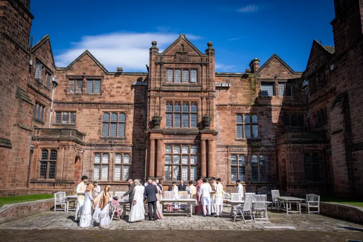 Outdoor seating in a manor house courtyard