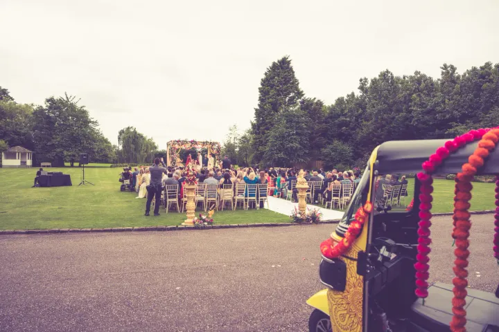 Guests at an outdoor celebration on a lawn