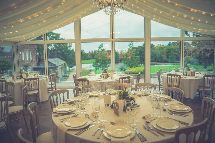 Reception table overlooking garden lawns