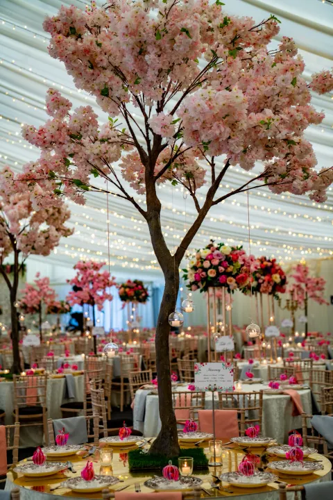 Pink blossom tree used as a table centrepiece