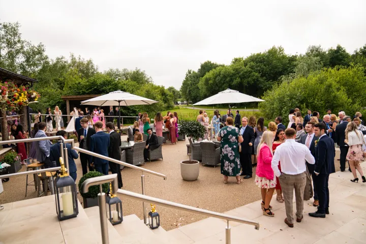 Guests gathered on a garden terrace