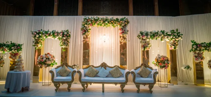 Elegant wedding stage framed by flowers