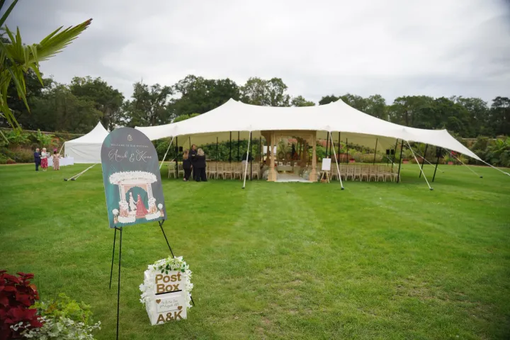 Sailcloth marquee on a green lawn