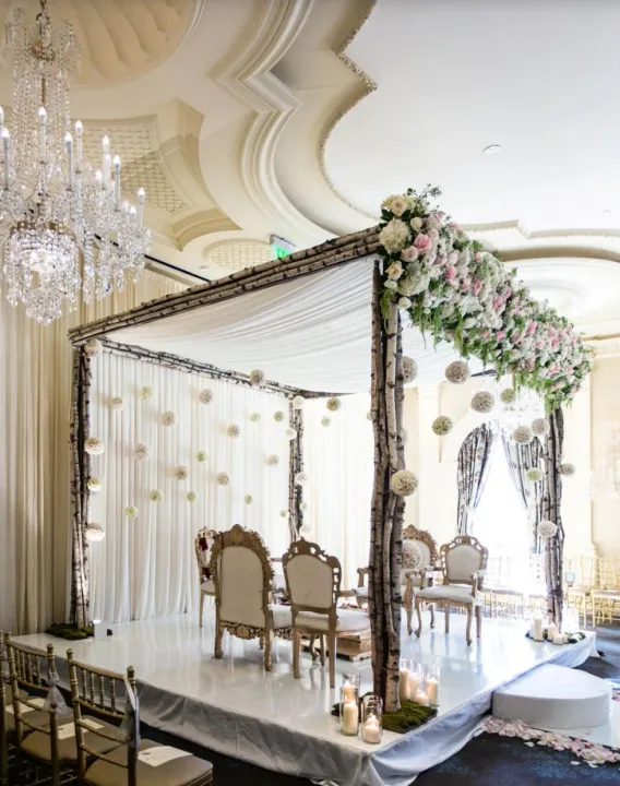 Floral ceremony canopy in an elegant room