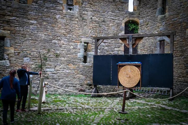 A ceremonial gong in a castle courtyard