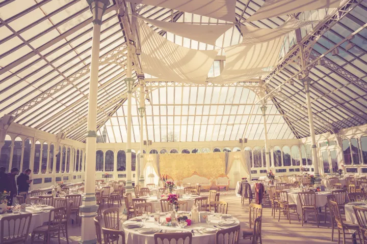 A conservatory dressed for a wedding reception